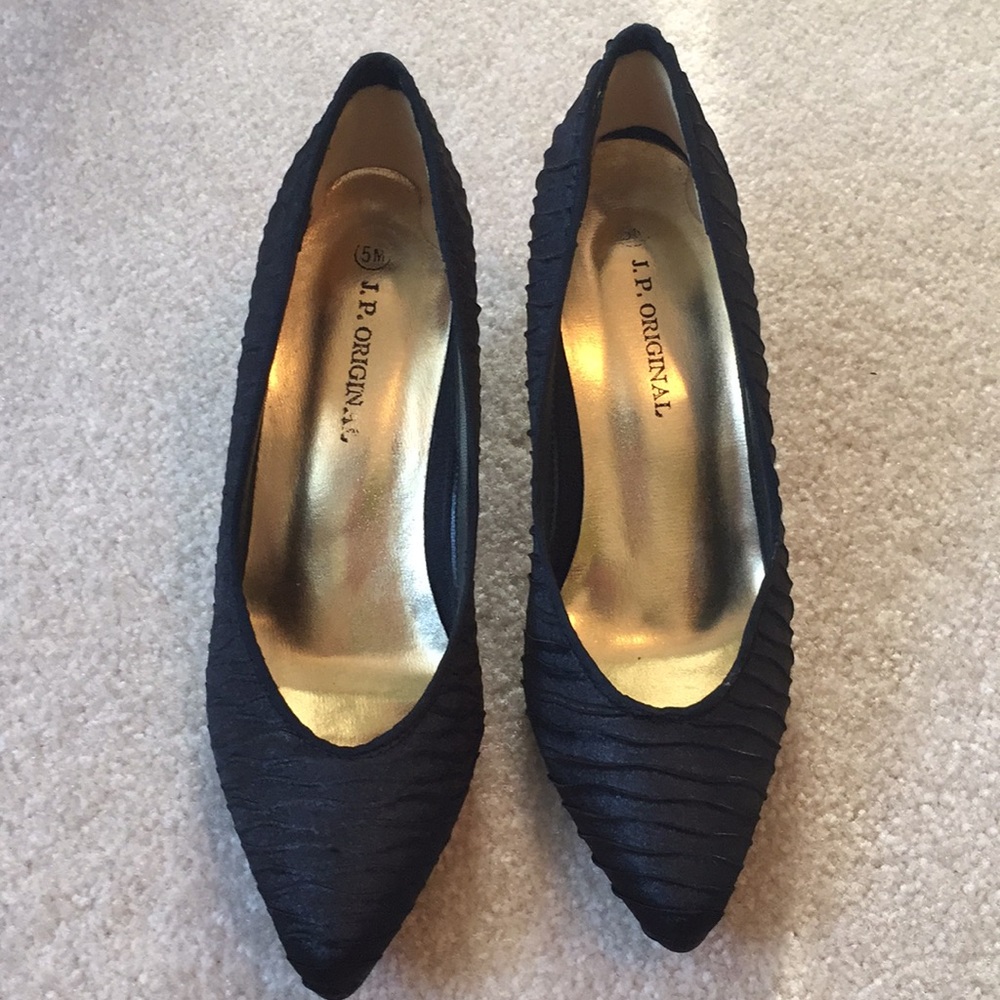 Dressy black pumps.